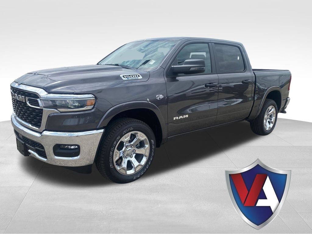 2026 RAM Ram 1500 RAM 1500 BIG HORN CREW CAB 4X4 5'7' BOX in Granite Crystal Metallic Clear-Coat Exterior Paint — front three-quarter view