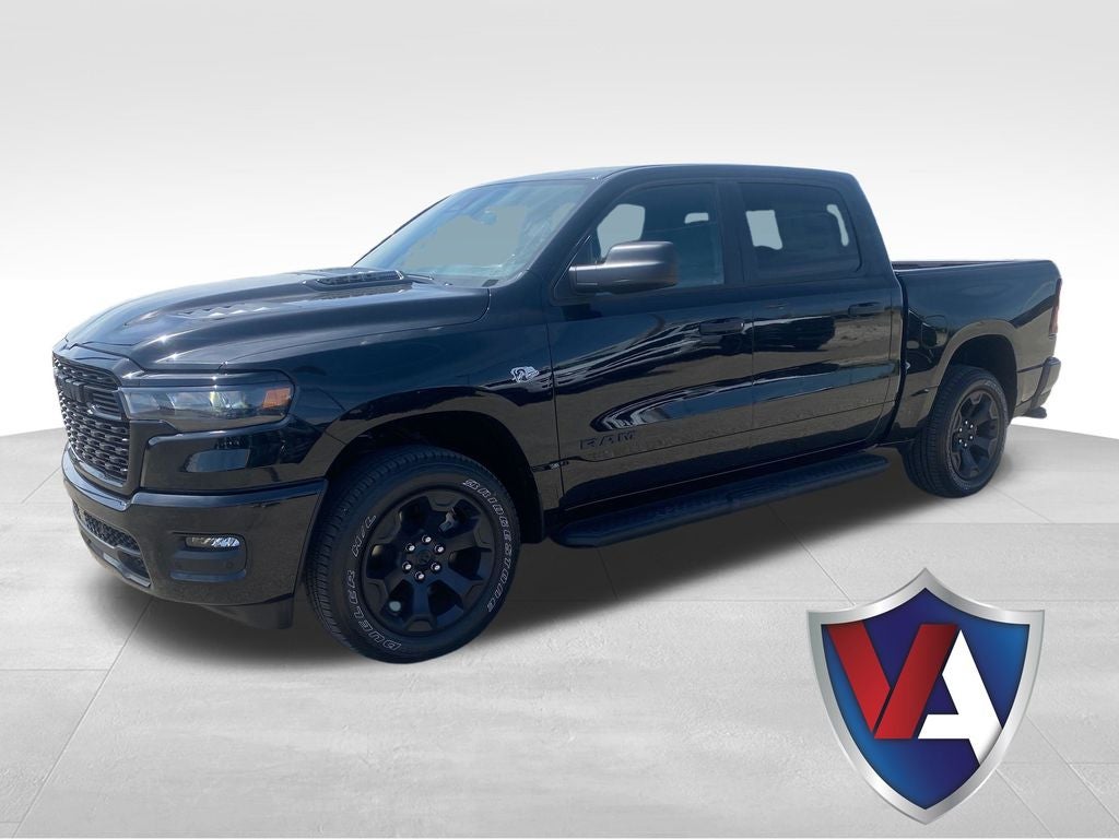 2026 RAM Ram 1500 RAM 1500 EXPRESS CREW CAB 4X4 5'7' BOX in Diamond Black Crystal Pearl-Coat Exterior Paint — front three-quarter view