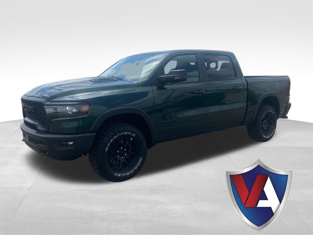 2026 RAM Ram 1500 RAM 1500 REBEL CREW CAB 4X4 5'7' BOX in Serrano-Green Metallic Exterior Paint — front three-quarter view