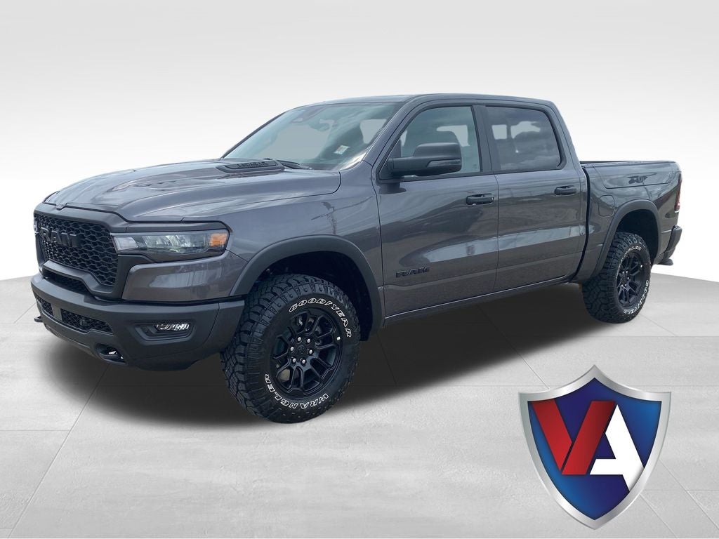 2026 RAM Ram 1500 RAM 1500 REBEL CREW CAB 4X4 5'7' BOX in Granite Crystal Metallic Clear-Coat Exterior Paint — front three-quarter view