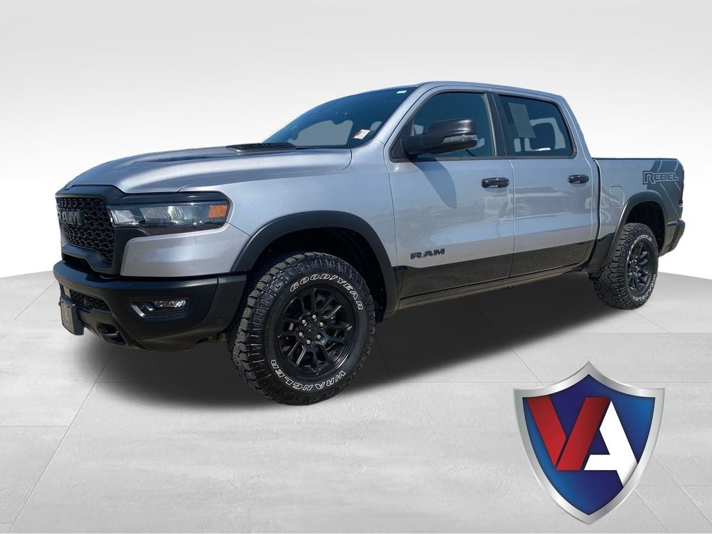 2025 RAM 1500 Rebel in Billet Silver Metallic Clearcoat — front three-quarter view