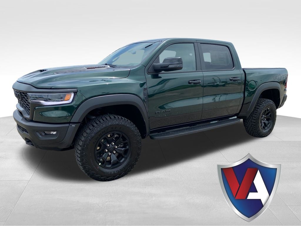 2026 RAM Ram 1500 RAM 1500 RHO CREW CAB 4X4 5'7' BOX in Serrano-Green Metallic Exterior Paint — front three-quarter view