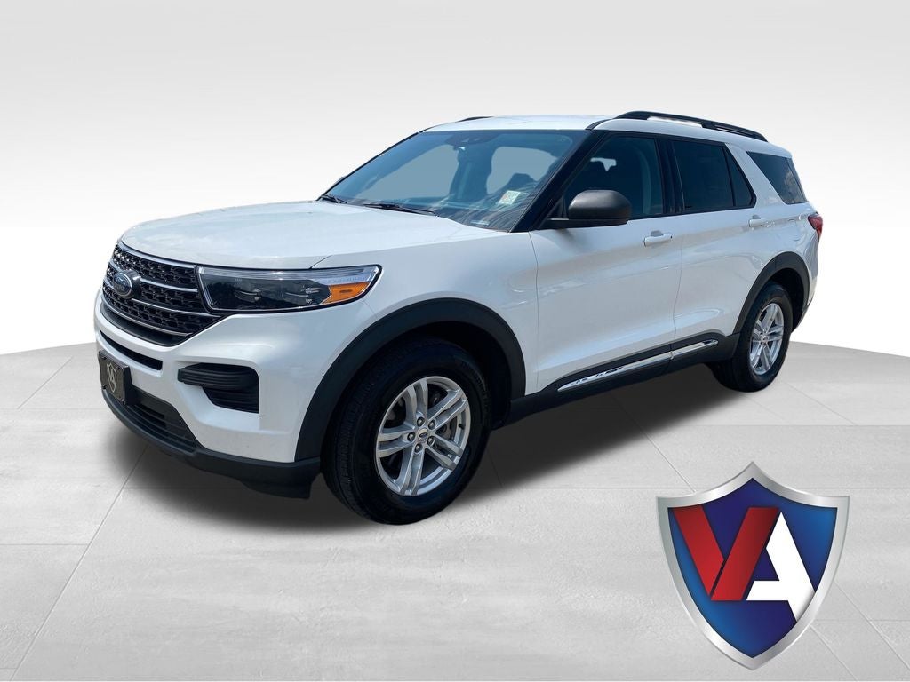 2023 Ford Explorer XLT in White Metallic — front three-quarter view