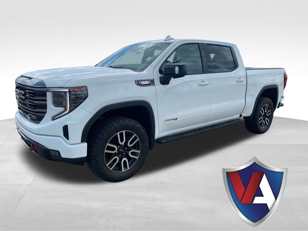 2022 GMC Sierra 1500 AT4 in Summit White — front three-quarter view