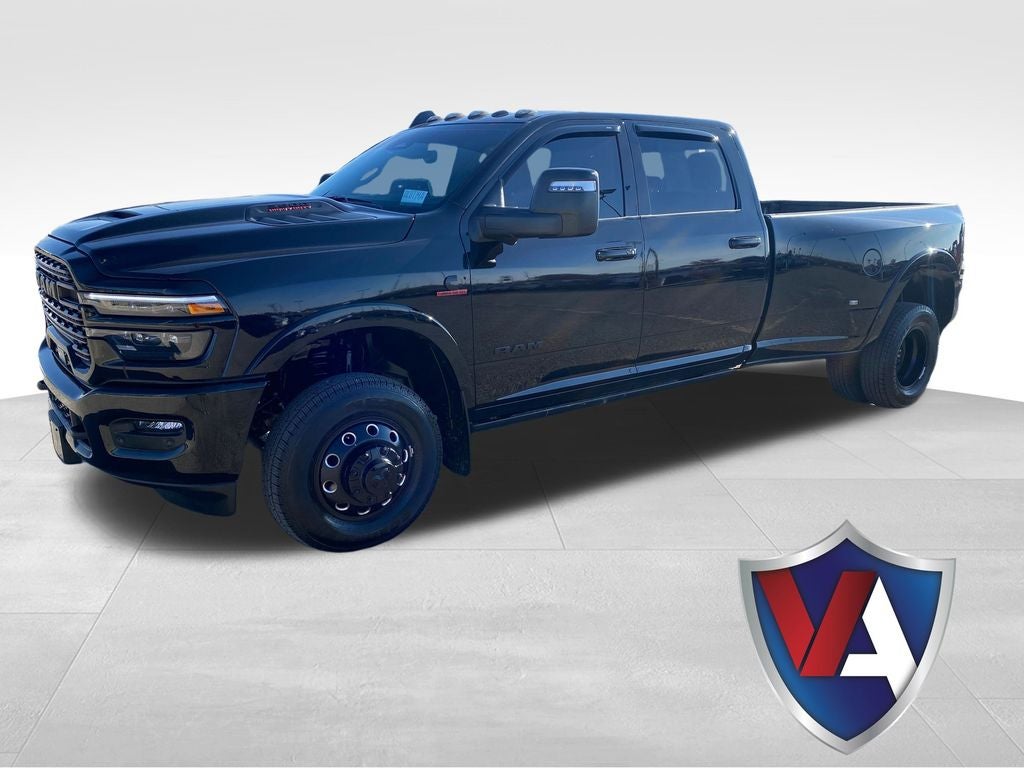 2025 RAM 3500 Limited Crew Cab 4x4 8' Box in Diamond Black Crystal Pearlcoat — front three-quarter view