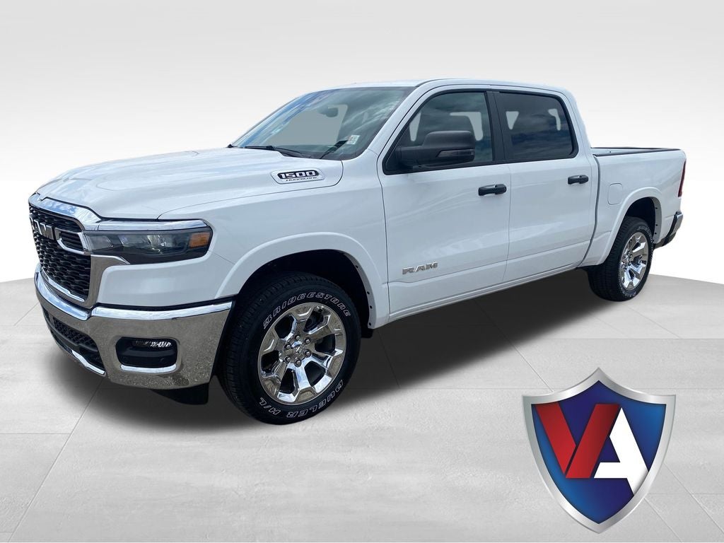 2026 RAM Ram 1500 RAM 1500 BIG HORN CREW CAB 4X4 5'7' BOX in Bright White Clear-Coat Exterior Paint — front three-quarter view